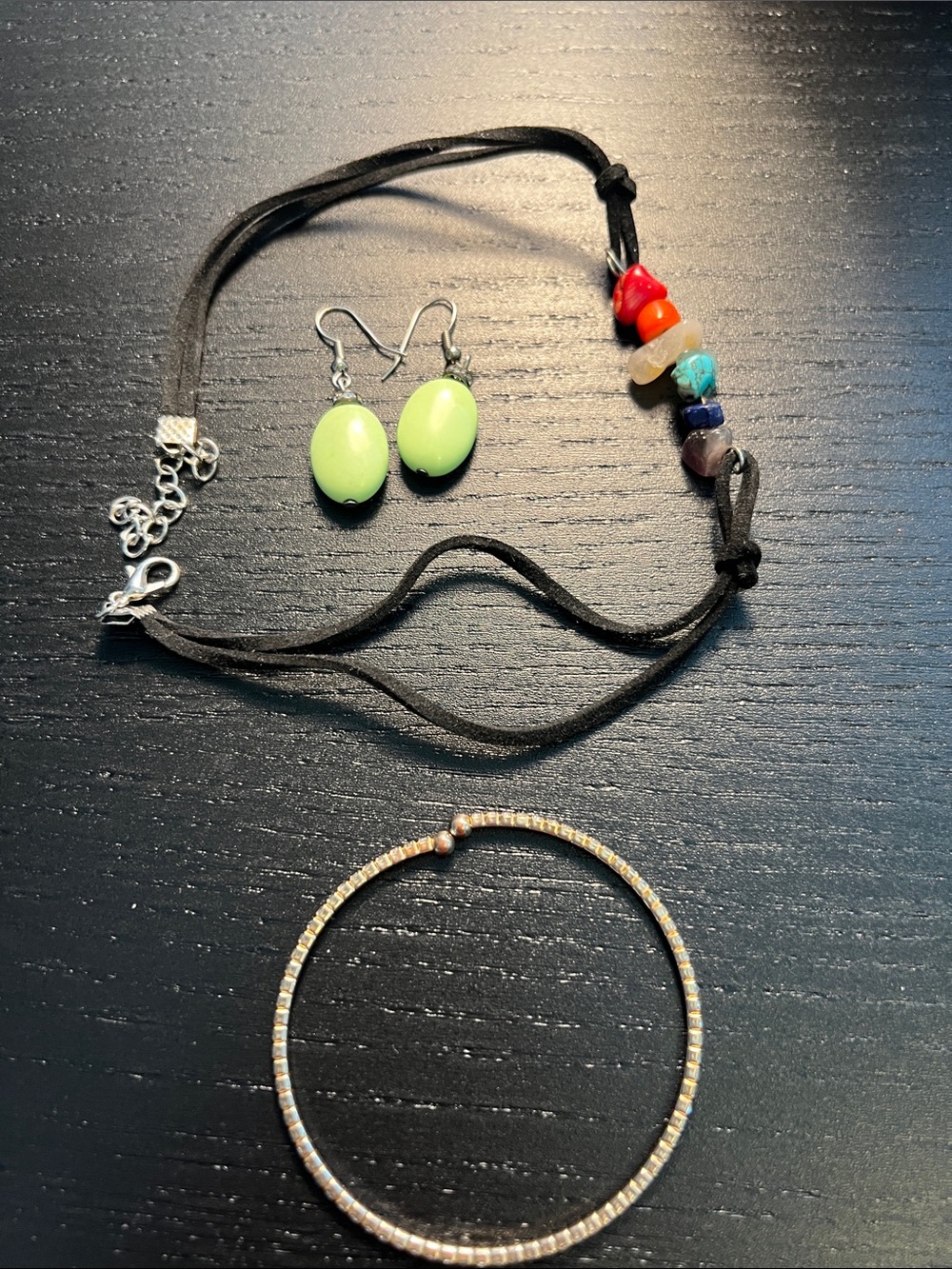 Mix jewelry two bracelets, and one pair of earrings.